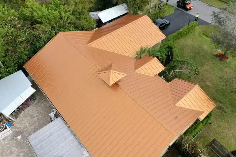 Expertly installed gold metal roof enhancing home durability and visual appeal.