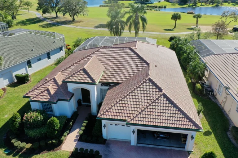 Skilled roofer installing durable roof tiles for long-lasting protection and aesthetic appeal.
