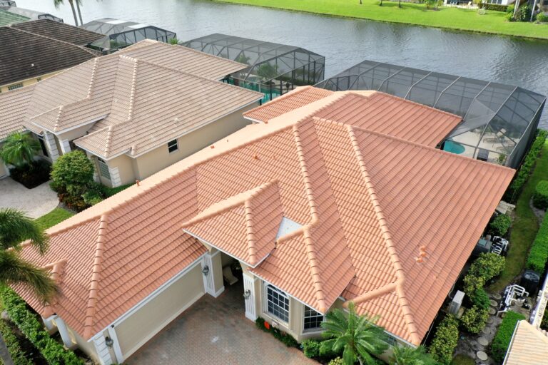 Installing roof with expert precision during metal roofing project for long-lasting protection.