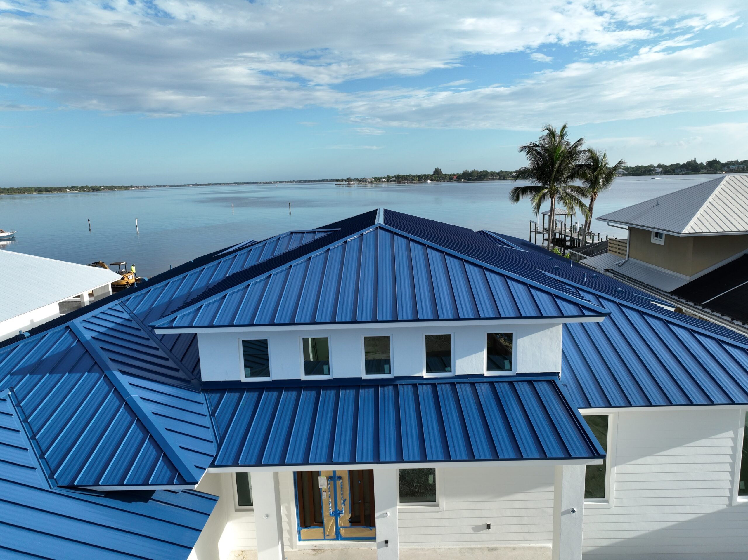 How We Saved a Palm Beach Dream Home with a Custom Blue Metal Roof 3