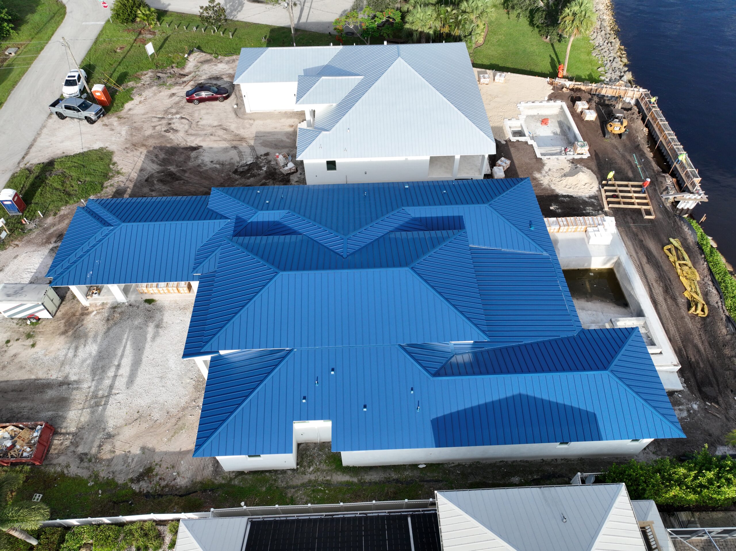 How We Saved a Palm Beach Dream Home with a Custom Blue Metal Roof 5